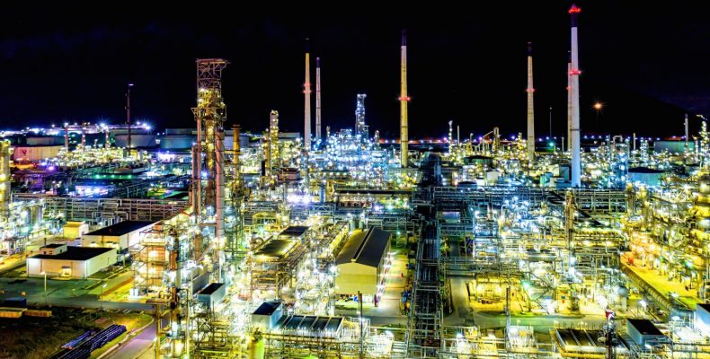 Aerial view. Oil refinery factory and oil storage tank at night